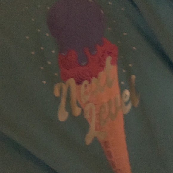 Size 14-16, blue next level workout tank top. Never worn - Picture 2 of 3